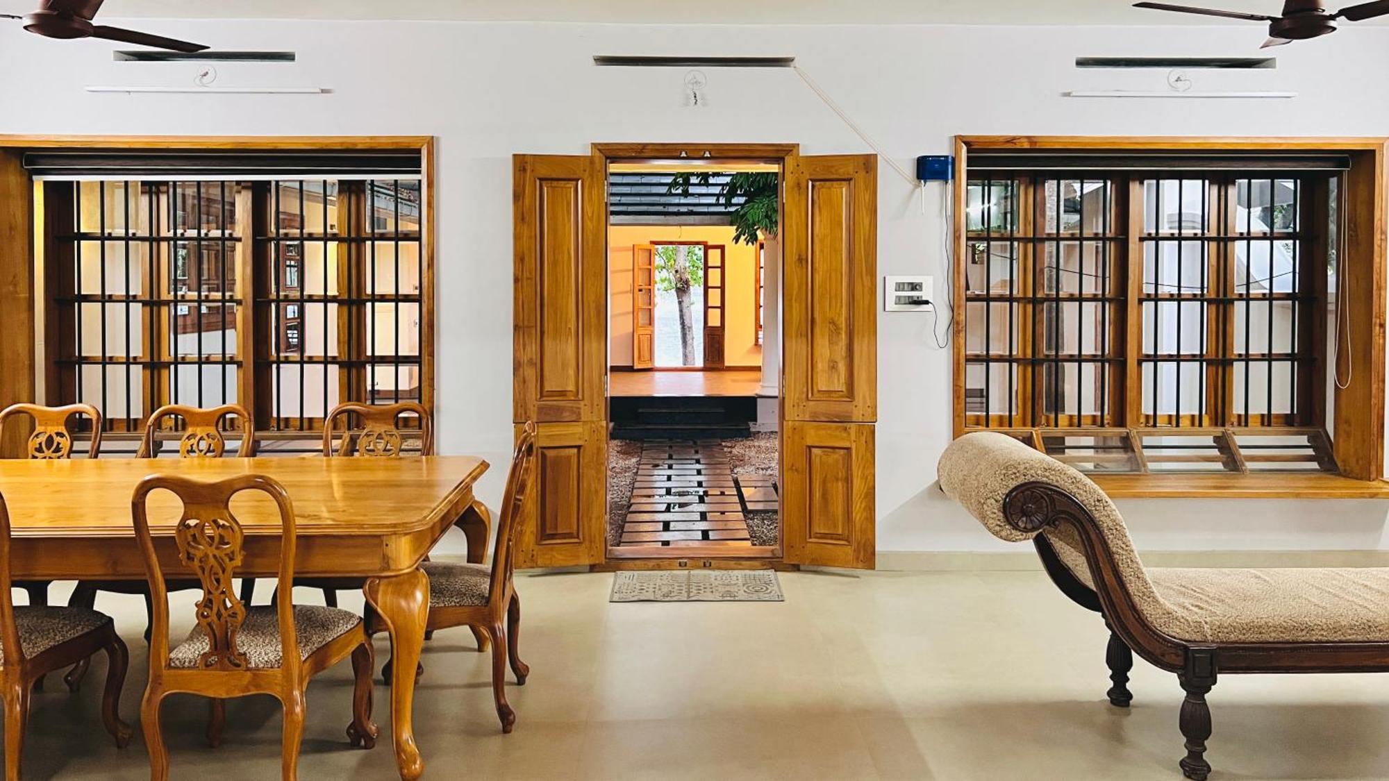 Waterfront By Palmyra Apartment Kollam Bagian luar foto