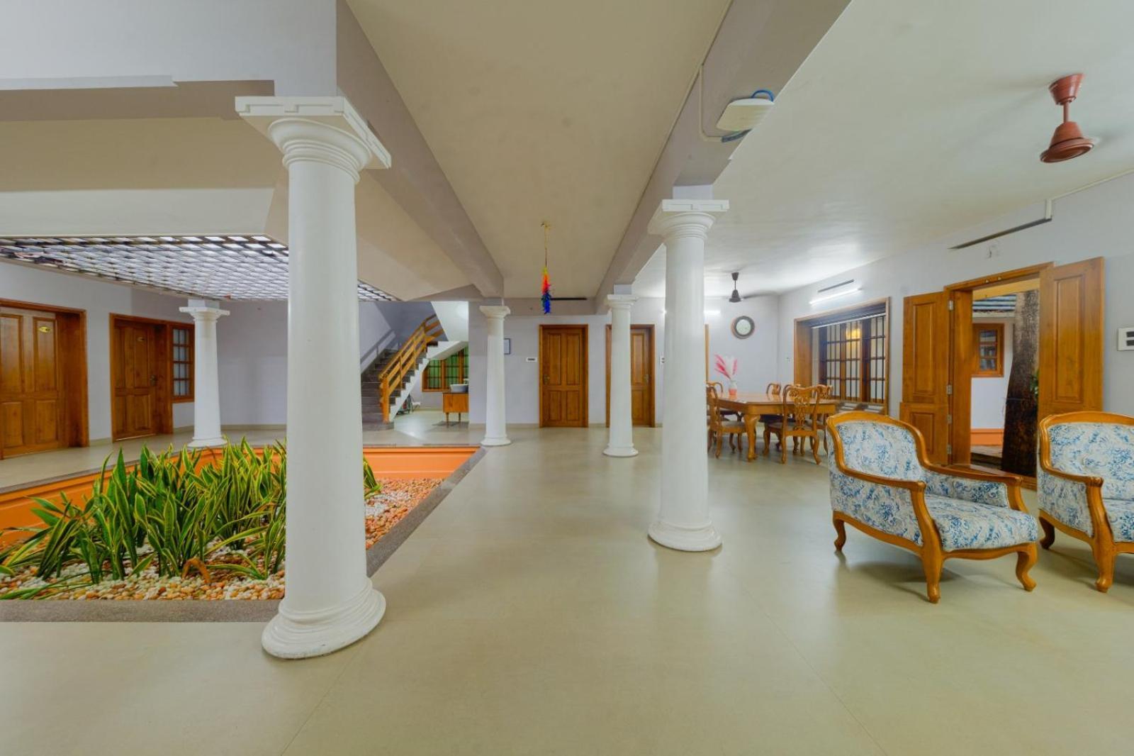 Waterfront By Palmyra Apartment Kollam Bagian luar foto