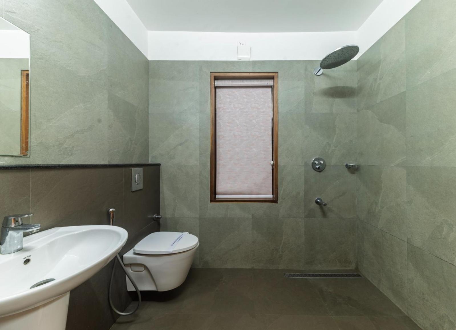 Waterfront By Palmyra Apartment Kollam Bagian luar foto
